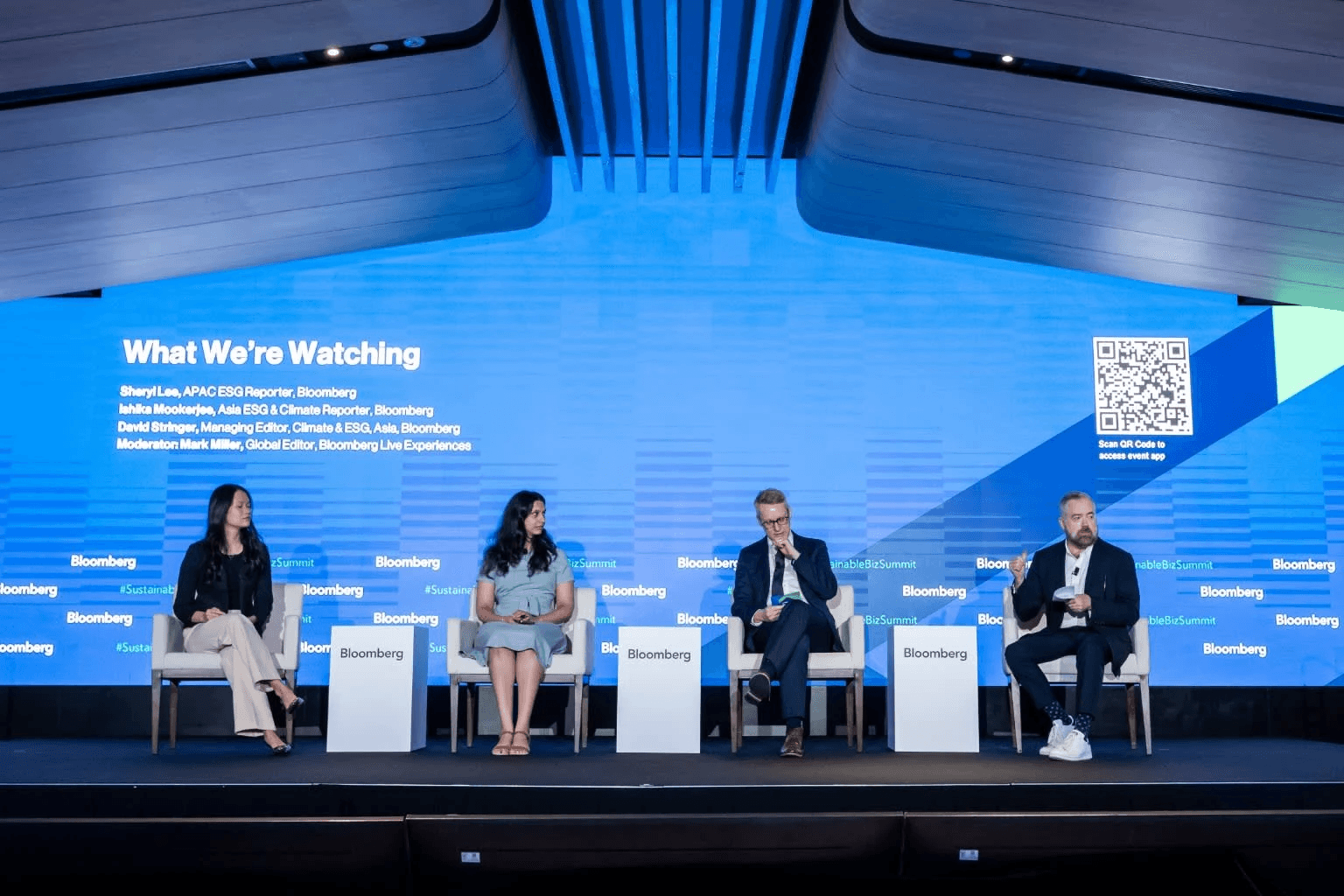 Four speakers on stage