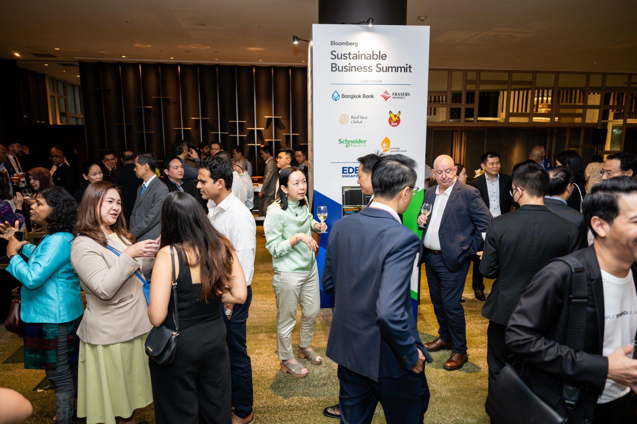 A large group of people at a networking reception
